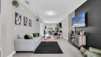 Smart TV, fireplace, books, offices