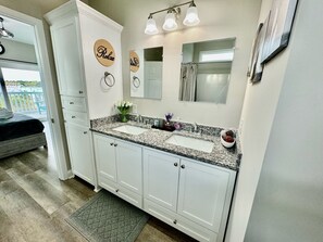 Hair dryer, towels, soap, shampoo
