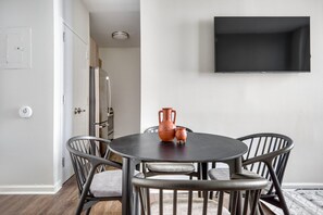 Dining - Dreamy Seaport 2BR w/ Gym & W/D, nr City Hall, by Blueground (Downtown)