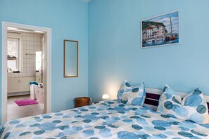 2 dormitorios, tabla de planchar con plancha, wifi gratis y ropa de cama