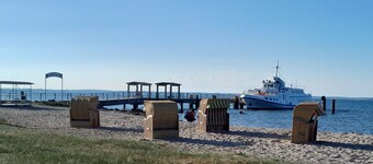 Holiday Apartment "Wikingerland Typ 2 Obergeschoss" with Balcony, Shared Garden & Wi-Fi