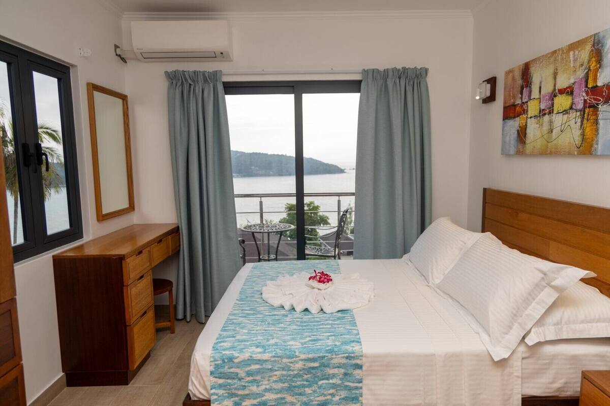 2 bedrooms, desk, blackout curtains, iron/ironing board