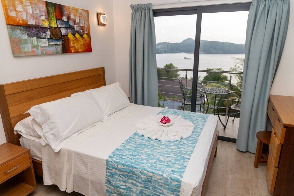 2 bedrooms, desk, blackout curtains, iron/ironing board