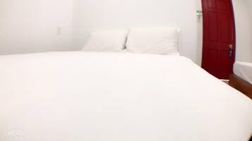 Economy Room, Multiple Beds, Garden View, Ground Floor | 1 bedroom, desk, free WiFi