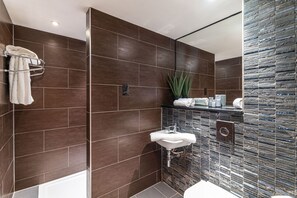 Shower, hydromassage showerhead, hair dryer, towels