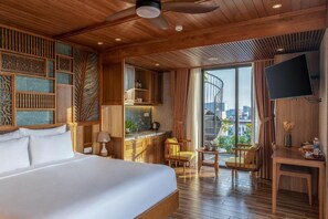 Romantic Penthouse, Patio, City View | Minibar, blackout drapes, soundproofing, free WiFi