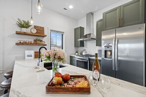 Fridge, stovetop, coffee/tea maker, toaster