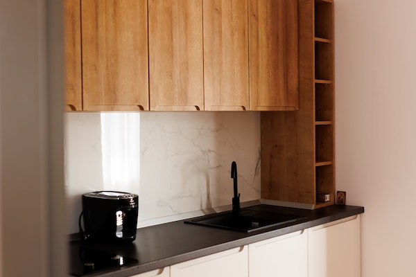 Deluxe Apartment | Private kitchen | Full-size fridge, microwave, stovetop, espresso maker