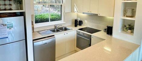 Coffee/tea maker, fridge, microwave, oven