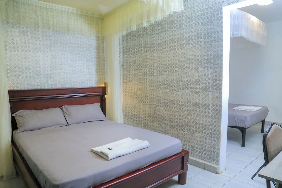 Family Twin Room | Individually furnished, desk, laptop workspace, free WiFi