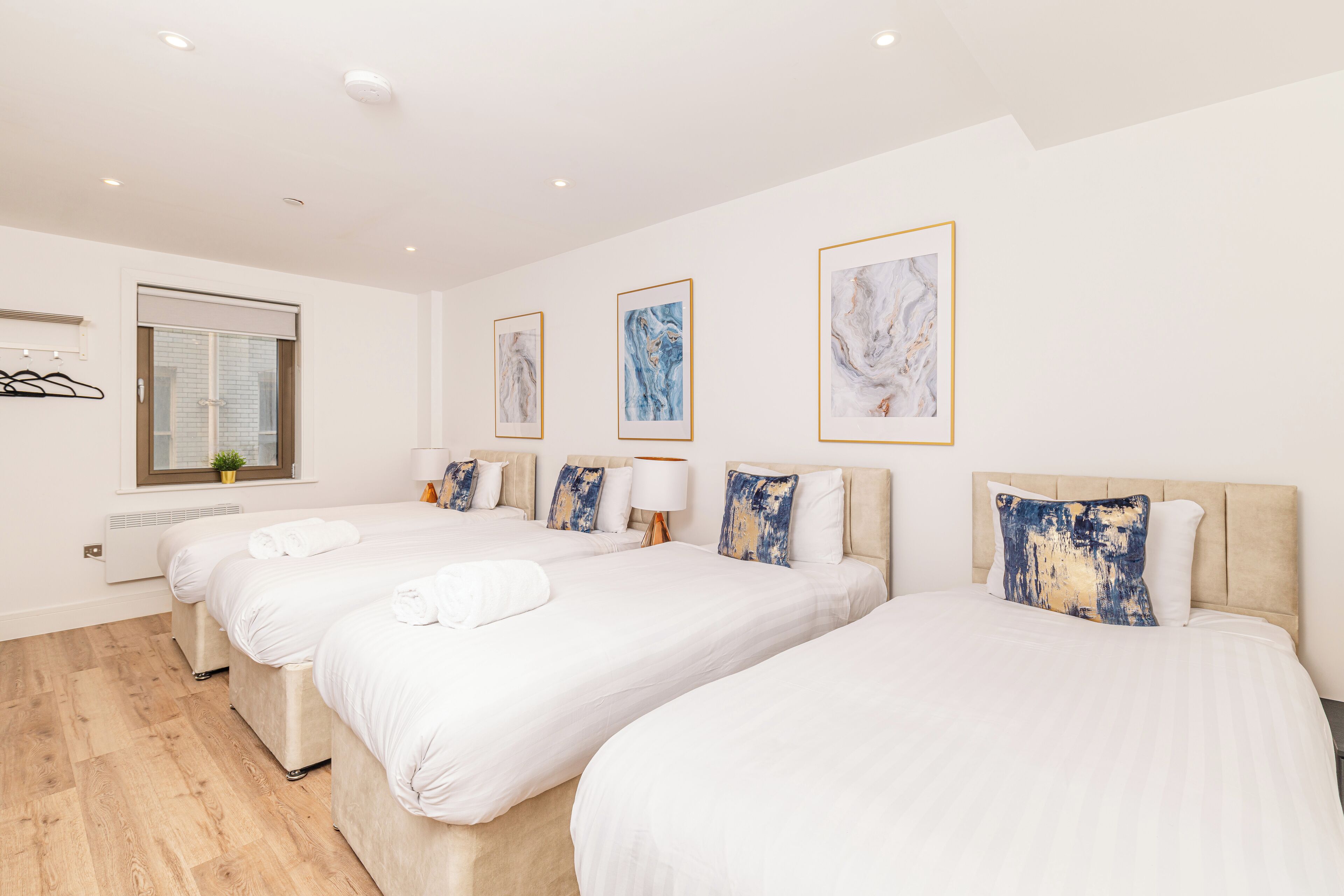 Desk, laptop workspace, blackout curtains, iron/ironing board