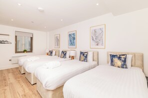 Desk, laptop workspace, blackout curtains, iron/ironing board