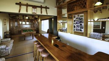 Comfort House | Living area | 42-inch flat-screen TV with satellite channels