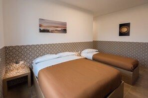 Superior Triple Room, City View | 1 bedroom, premium bedding, down comforters, pillowtop beds
