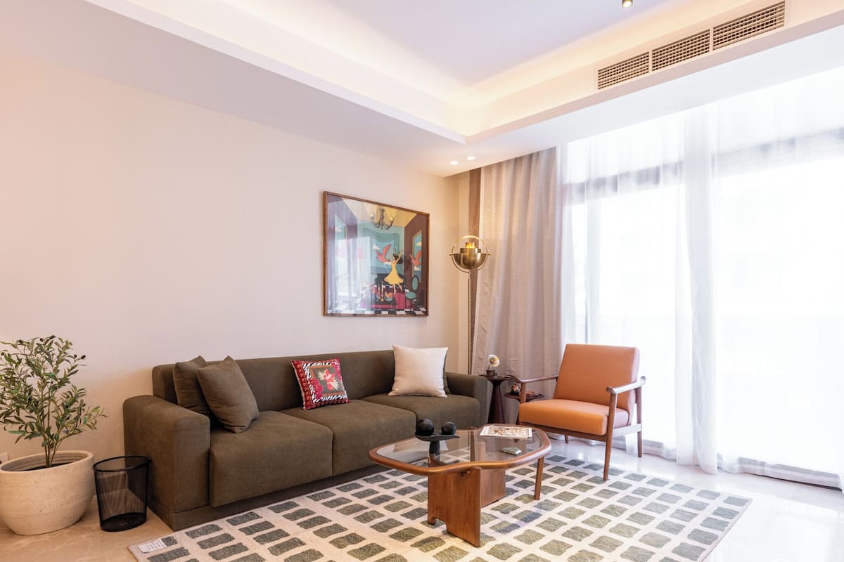 Basic Apartment, 2 Bedrooms, Garden View | Living area | 55-inch Smart TV with satellite channels