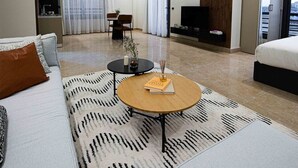 Studio | Living area | 43-inch LCD TV with satellite channels - BIRD NEST Near AUC (New Cairo)