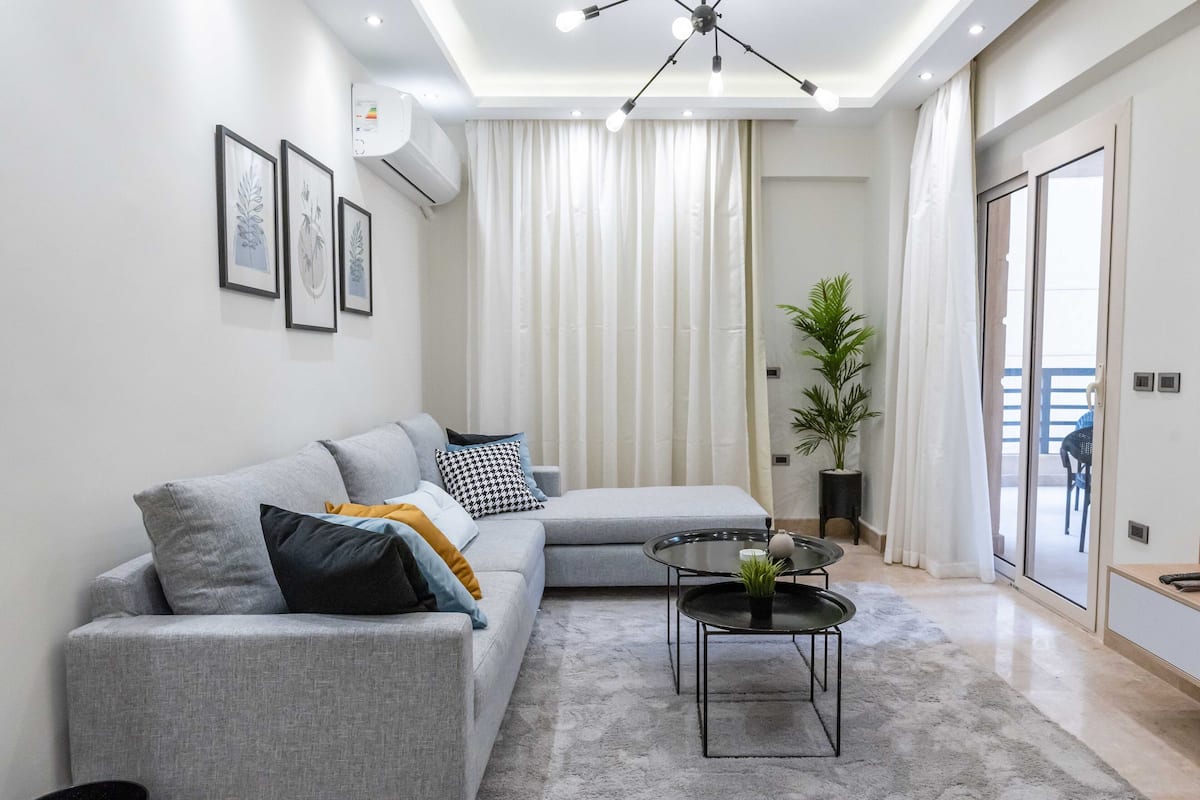 Classic Apartment, 3 Bedrooms | Living area | 43-inch LCD TV with satellite channels