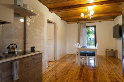 Cosy country house surrounded by a river, forests and meadows. 