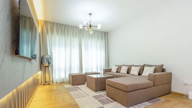 Elite Apartment | Living area - SuperHost - Tranquil Oasis in the Heart of Dubai Lakepoint N2 (Dubai)