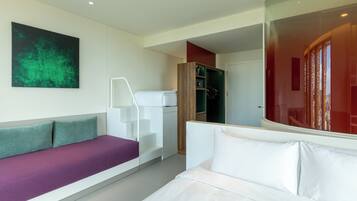 Deluxe Room, Multiple Beds, City View | Premium bedding, down duvets, memory-foam beds, minibar