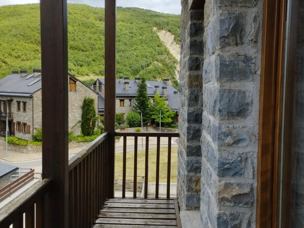 Enjoy the serene view of the surrounding residential area from this balcony.