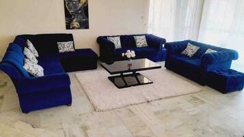 Family House | Living area | 24-inch Smart TV with digital channels