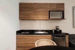 Fridge, microwave, stovetop, coffee/tea maker