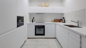 Private kitchen - 169 Suite W - Elegant Apartment in Paris (Paris 02 Bourse)