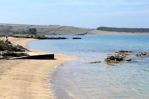 On the beach, sun-loungers