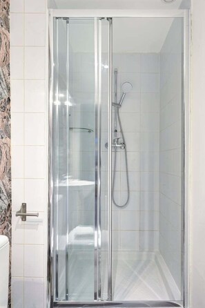 Shower, towels, soap, shampoo