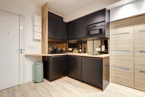 Fridge, microwave, coffee/tea maker, toaster