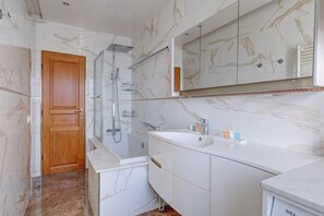 Hair dryer, towels, soap, shampoo