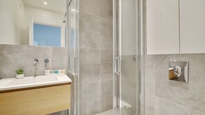 Shower, hair dryer, towels