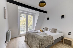 1 chambre, fer et planche à repasser, accès Internet, draps fournis