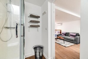 Shower, hair dryer, towels, soap