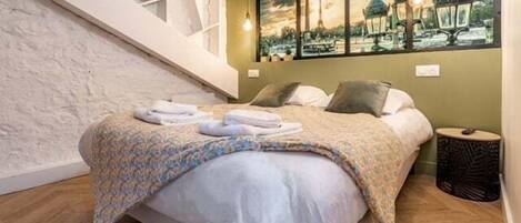 2 habitaciones, tabla de planchar con plancha, wifi y ropa de cama