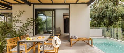 Superior Suite with Private Pool | Living area | 42-inch flat-screen TV with satellite channels