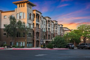A multi-story hotel with a modern architectural design, featuring balconies and a prominent entrance. - Location, Luxury Amenities, Walk to everything! (Phoenix)
