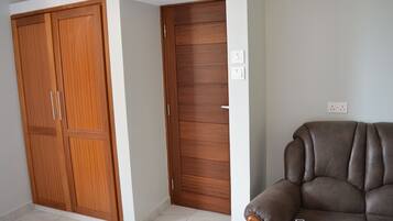 Executive Apartment | Living area | 43-inch Smart TV with digital channels, Netflix, streaming services