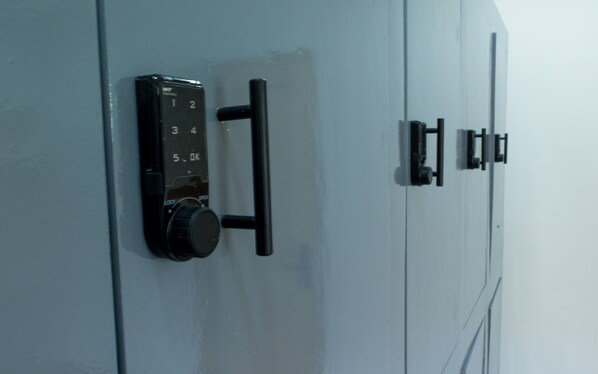 A door with a numeric keypad lock and a keyhole.