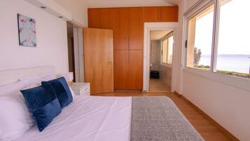 Luxury Villa, Sea View | 4 bedrooms, in-room safe, blackout curtains, iron/ironing board