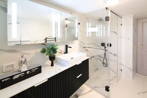 Shower, towels, soap, shampoo