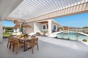 Outdoor dining - Golf Beach Villa with private pool (Rhodes)