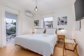 4 habitaciones, tabla de planchar con plancha, wifi y ropa de cama 