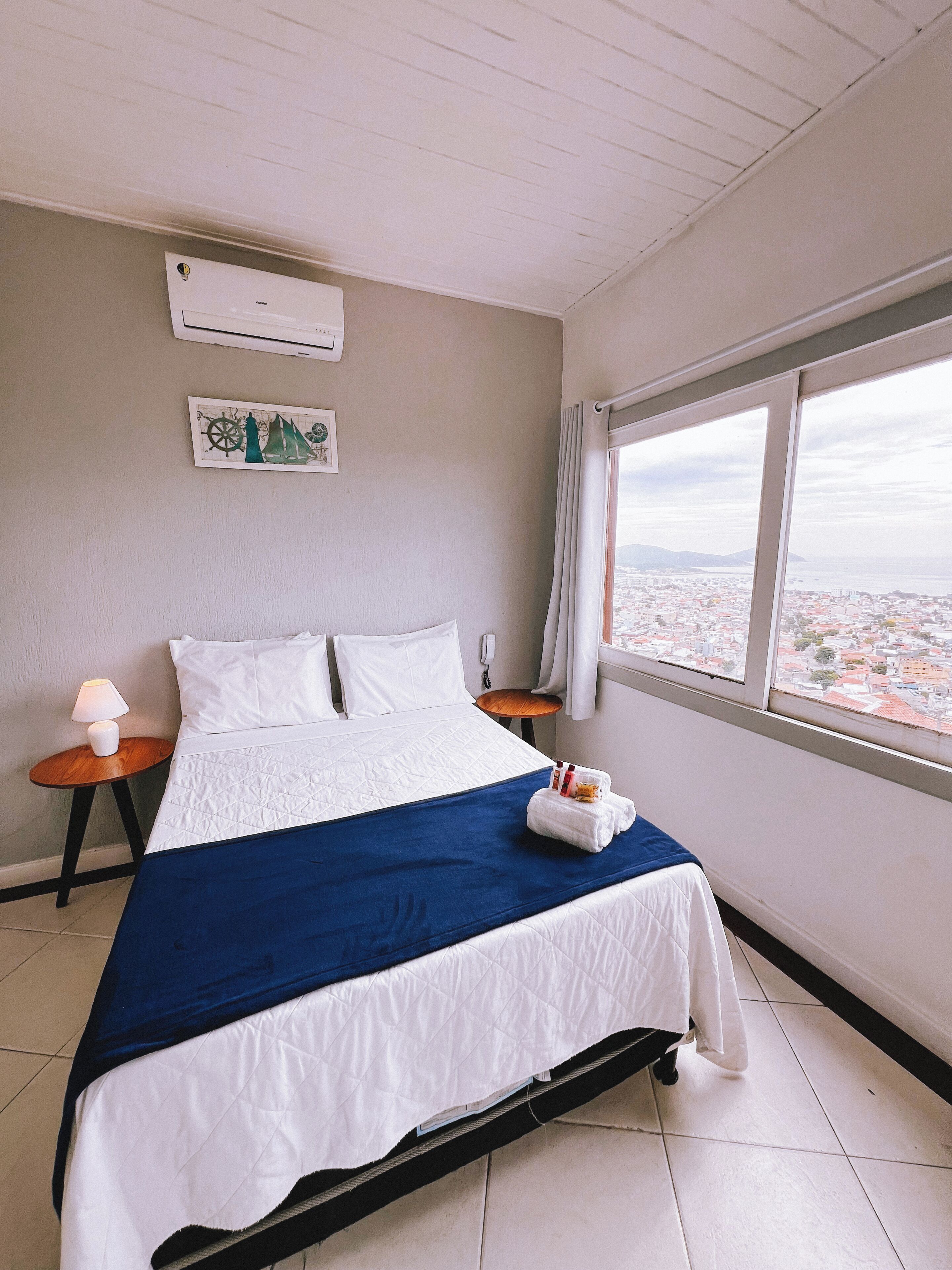 Superior Triple Room, Patio, City View | WiFi (free), bed sheets