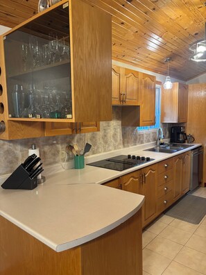 Fridge, stovetop, coffee/tea maker, electric kettle