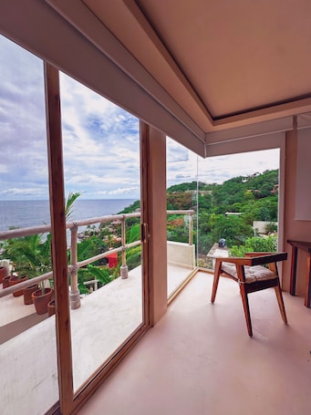 Deluxe Room, Ocean View | Living area. Xeno Hotel Boutique
