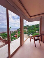 Quarto luxo, vista para o oceano | Área de estar