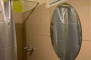 Shower, towels, soap, toilet paper