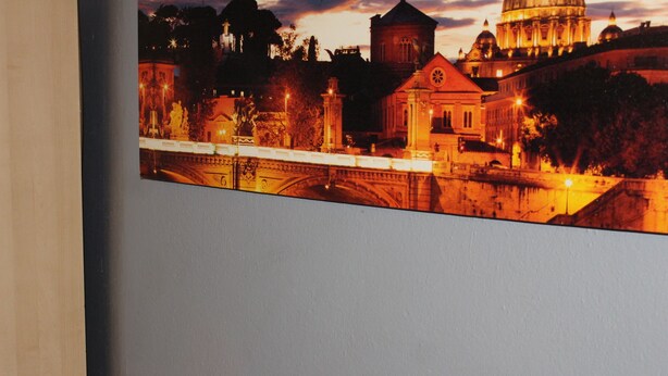 A photograph of a cityscape with a prominent bridge and buildings, including a large dome structure. - Renovated Studio Olympiados (Thessaloniki)